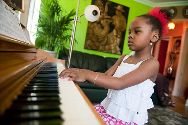 Haitian Child Prodigy Speaks Six Languages and  Plays Seven Instruments !