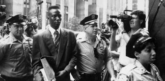 image Accused rapist Yusef Salaam is escorted by police.